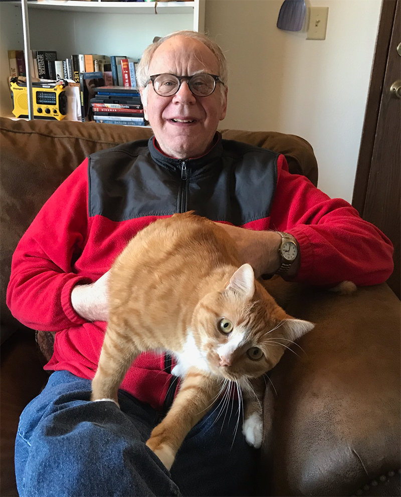 John holding Gus
